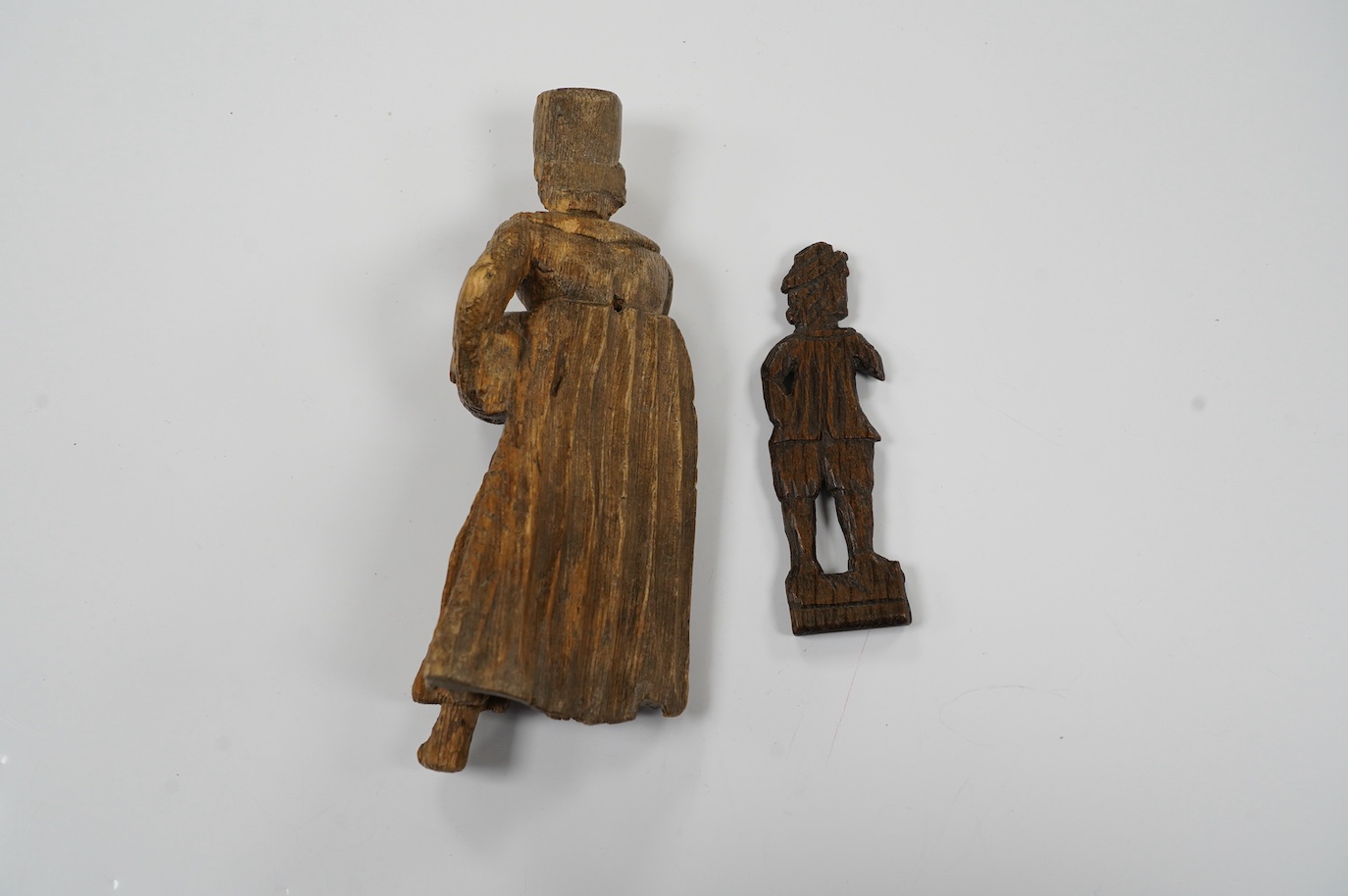 Two 17th century or earlier, European carved oak figures, tallest 20cm high. Condition - fair considering age